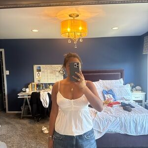 Cute white button up Brandy tank with adjustable straps  
#summervibes